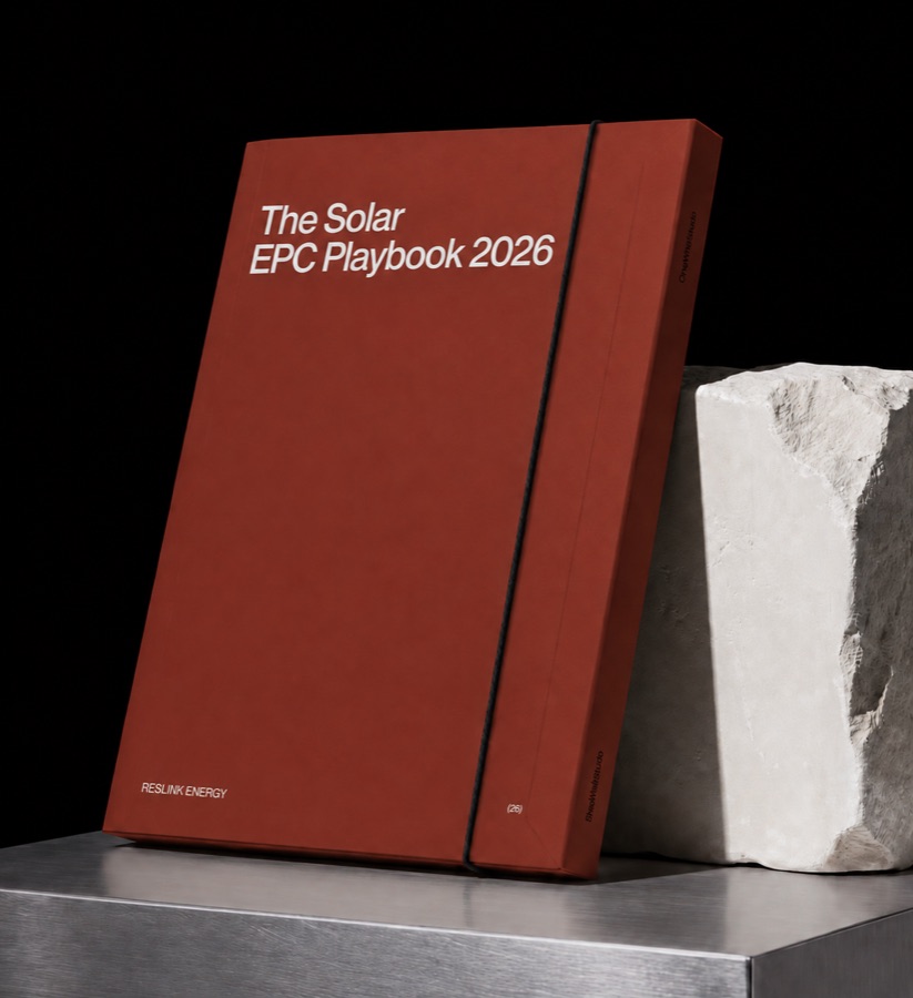 The Solar EPC Playbook 2026 report standing on a metal plinth beside a block of stone