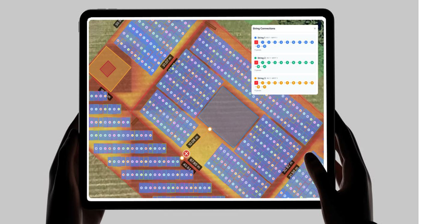 Tablet showing automatic panel placement and inverter stringing