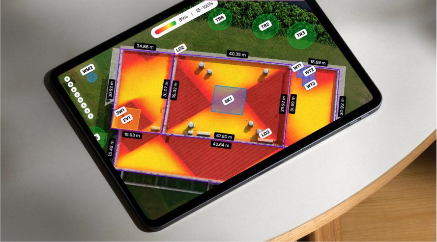 Tablet on a table showing a roof heat map with measured edges