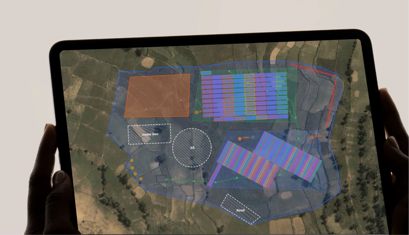 Tablet showing a ground-mount array being revised on site